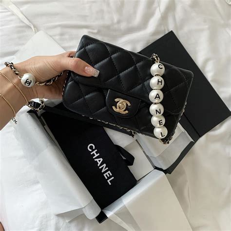 chanel handbags with pearls on strap|Chanel patch pocket handbags.